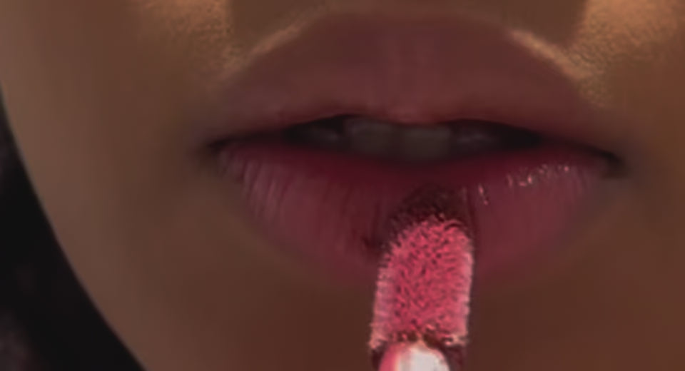 video of applying cherry noir lip cream